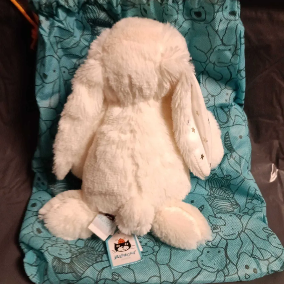 JELLYCAT LONDON CREAM PLUSH BUNNY WITH TEAL DRAWSTRING BAG – 'I AM CUTE DOLL' TAG
