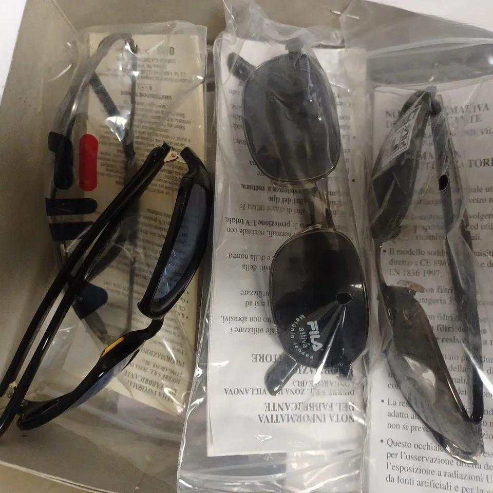 APPROXIMATLEY 9 FILA SUNGLASSES TO INCLUDE MODELS 8180M / 0568, 8081M / 0568, 8604 / 700 ETC  