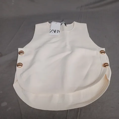 ZARA CREAM BIB EUR SMALL