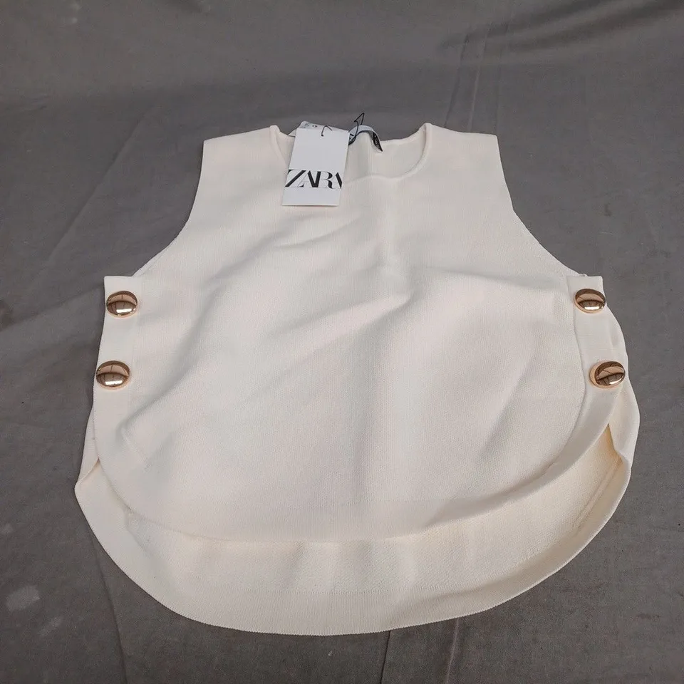ZARA CREAM BIB EUR SMALL