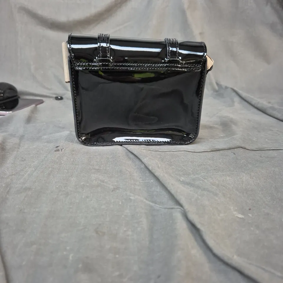 DR. MARTENS BLACK PATENT LEATHER SATCHEL BAG WITH TWIN BUCKLE STRAPS