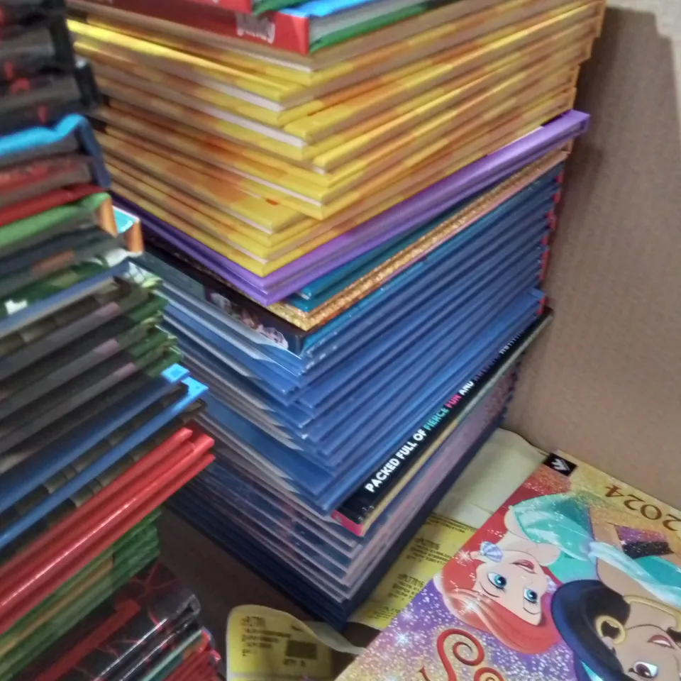 LARGE QUANTITY OF ASSORTED 2024 ANNUALS TO INCLUDE LOL SURPRISE, GUINESS RECORDS, DISNEY PRINCESS AND COCOMELON