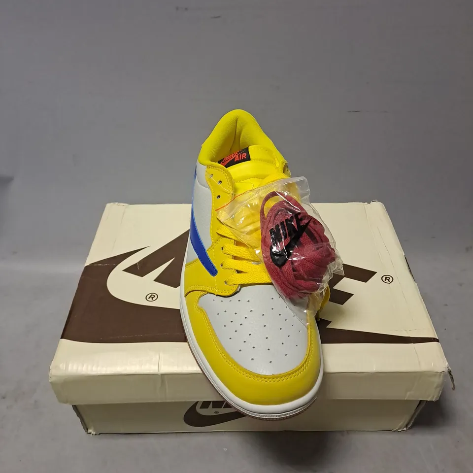 BOXED PAIR OF NIKE TRAVIS SCOTT AIR JORDAN 1 LOW OG SNEAKERS IN CANARY SIZE 11