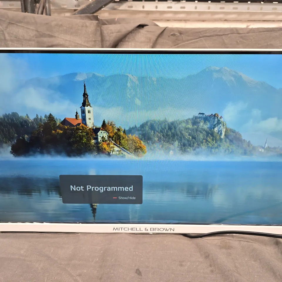 BOXED MITCHELL & BROWN 24CU1811W SMART HD TV 