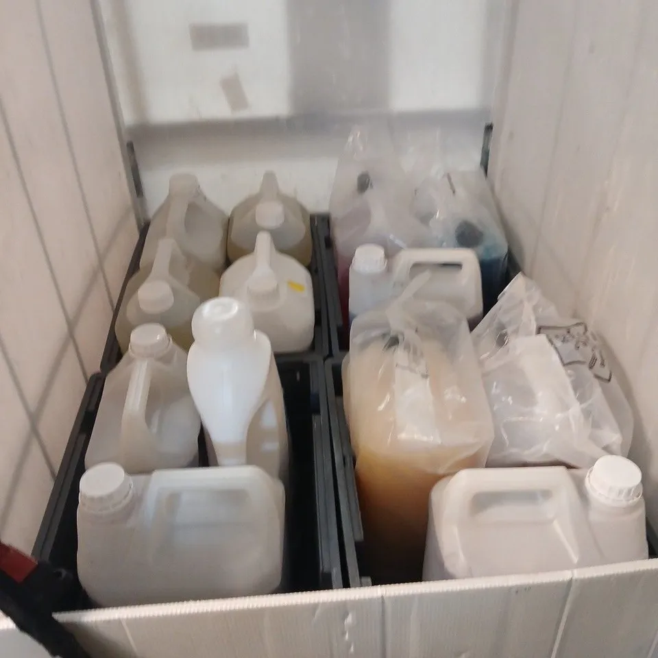 CAGE OF ASSORTED OVERSIZED LIQUIDS