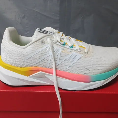 BOXED PAIR OF NEW BALANCE FUELCELL PROPEL TRAINERS IN WHITE - UK 9.5