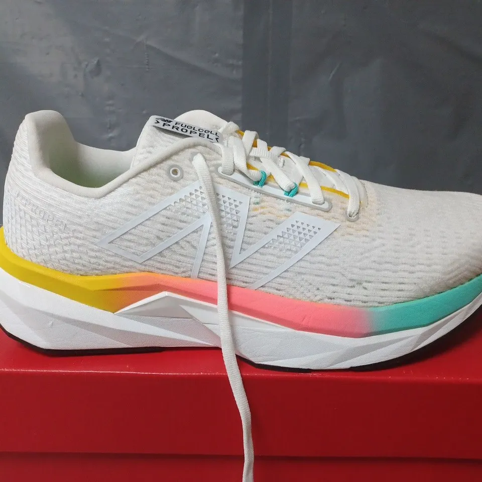 BOXED PAIR OF NEW BALANCE FUELCELL PROPEL TRAINERS IN WHITE - UK 9.5