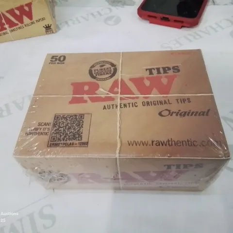 BOX CONTAINING 50 PACKS OF RAW TIPS.