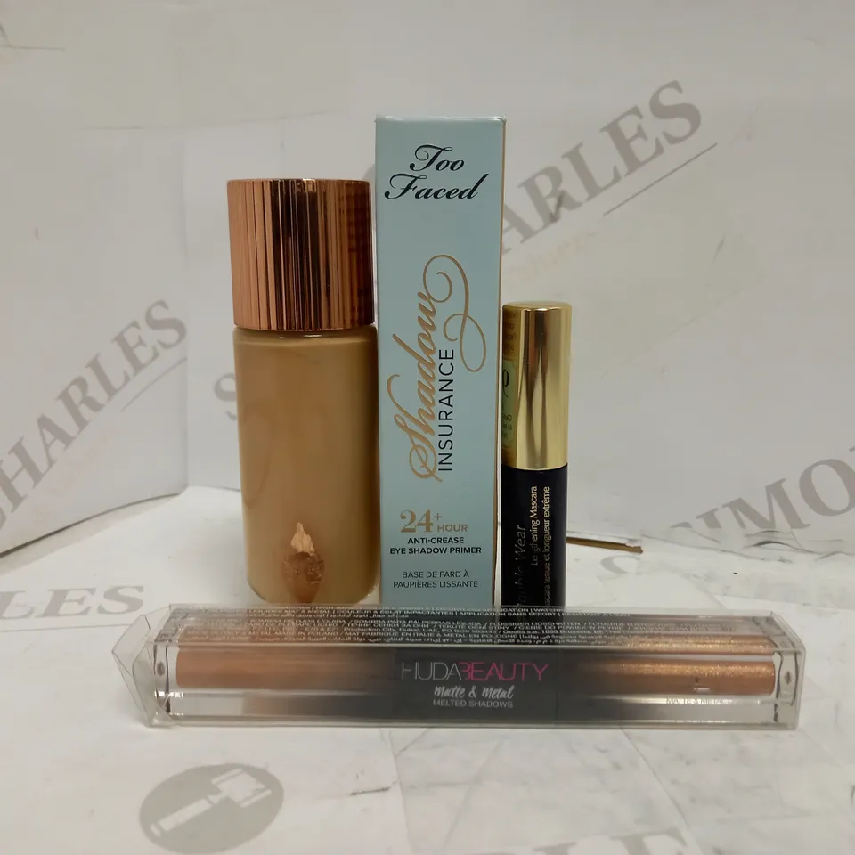 LOT OF 4 DESIGNER MAKE UP ITEMS, TO INCLUDE ESTEE LAUDER, HUDA, TOO FACED & CHARLOTTE TILBURY