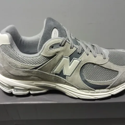 BOXED PAIR OF NEW BALANCE 2002R IN GREY - UK 11