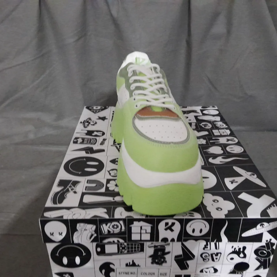 BOXED PAIR OF KOI KIWI JUICE TRAINERS IN GREEN SIZE 6 