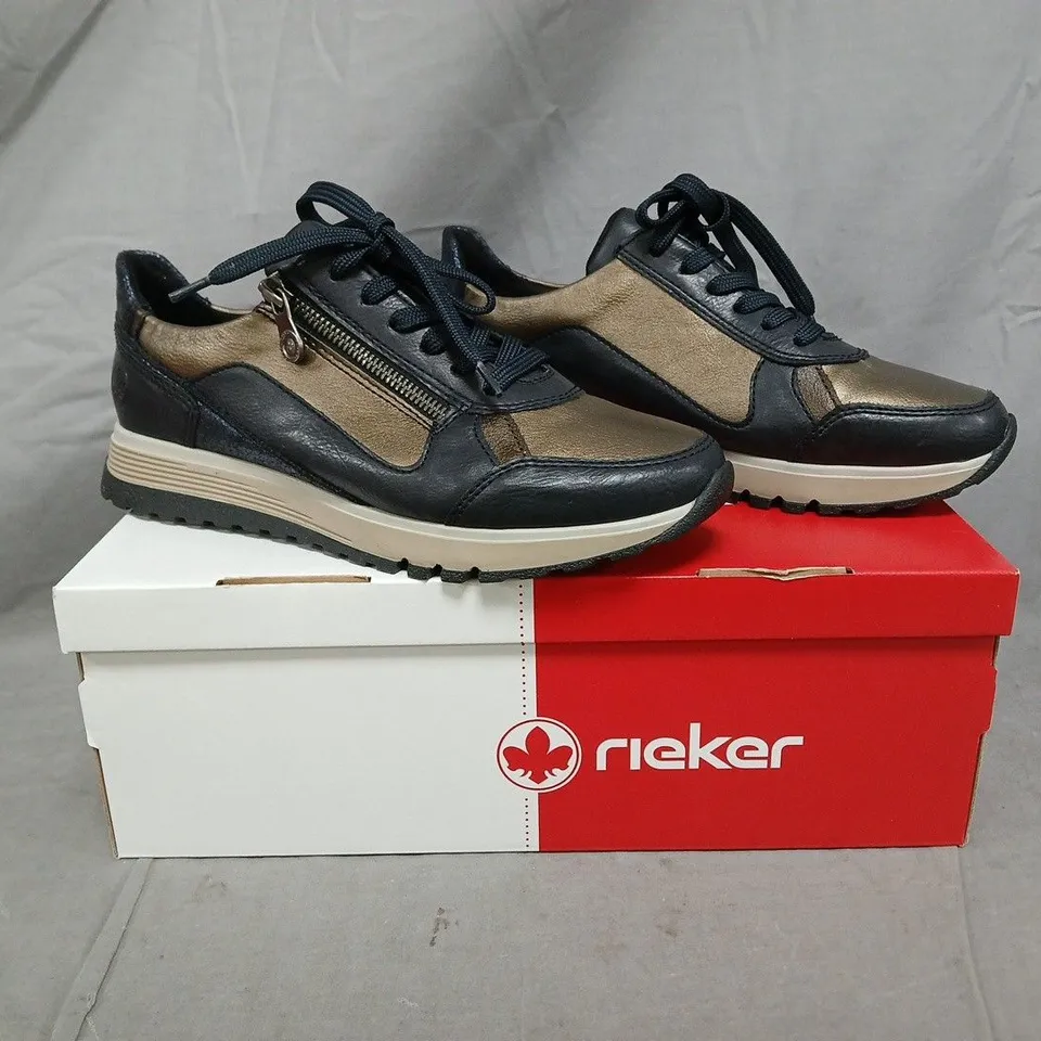 BOXED PAIR OF RIEKER SHOES IN BLACK/GOLD SIZE 6.5