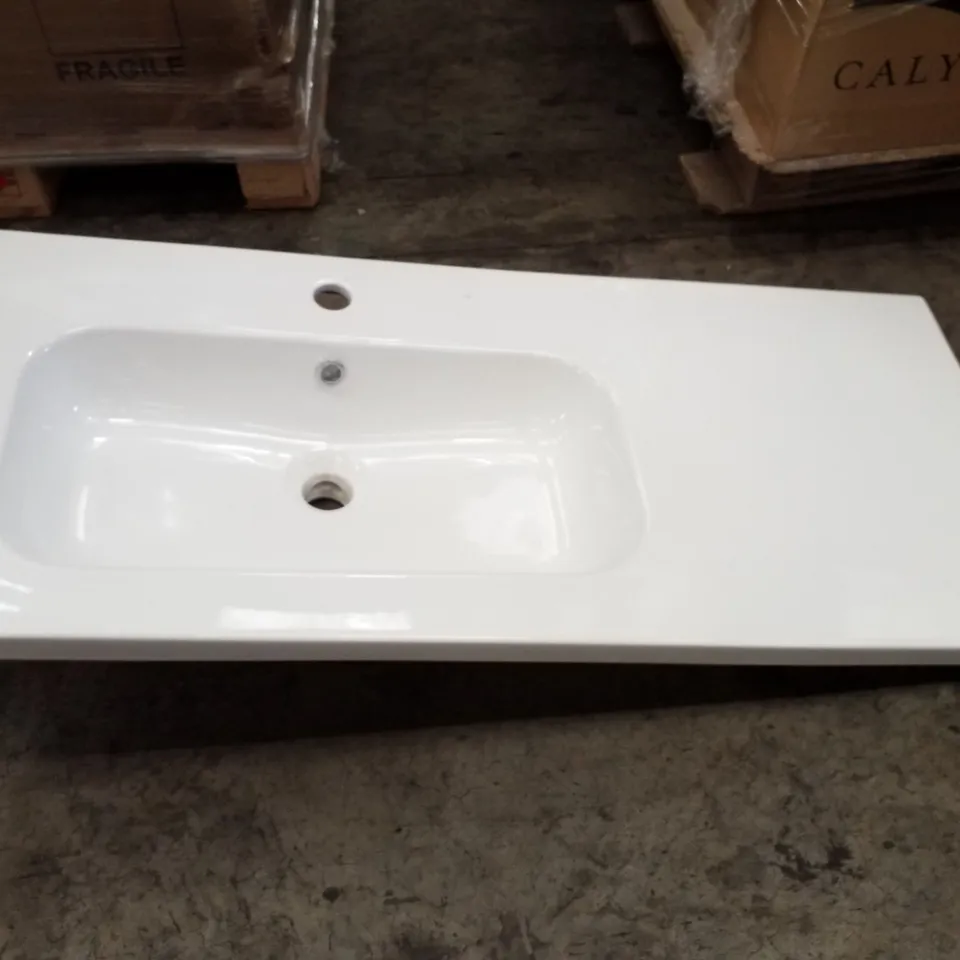 BOXED AS NEW CALYPSO AQUARA 1000MM CERAMIC VANITY TOP IN WHITE - 480X1100X200MM