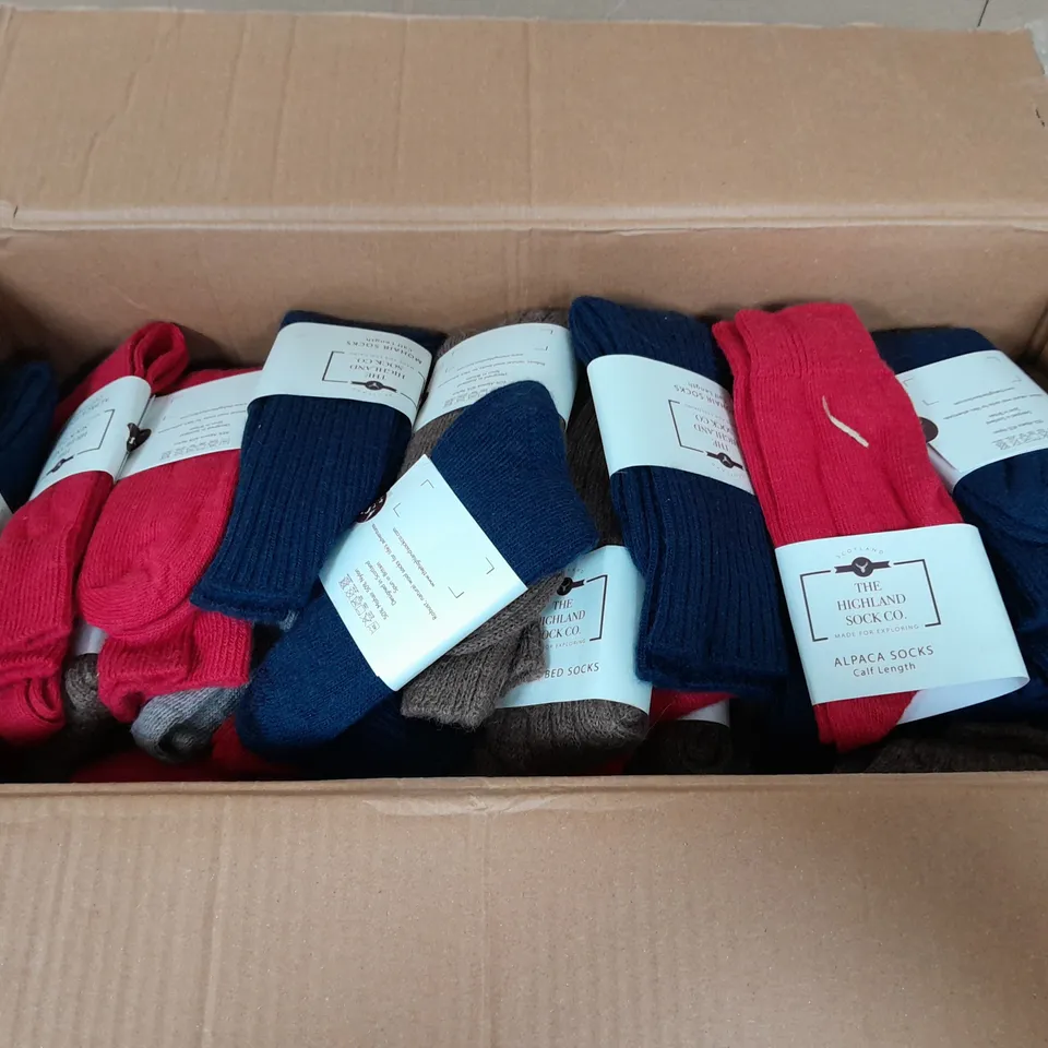 APPROXIMATELY 60 PAIRS OF HIGHLAND SOCK CO PAIRS OF SOCKS IN VARIOUS STYLES AND COLOURS TO INCLUDE MOHAIR CALF LENGTH BLUE, ALPACA CALF LENGTH RED, AND BROWN ALPACA BED SOCKS ETC.