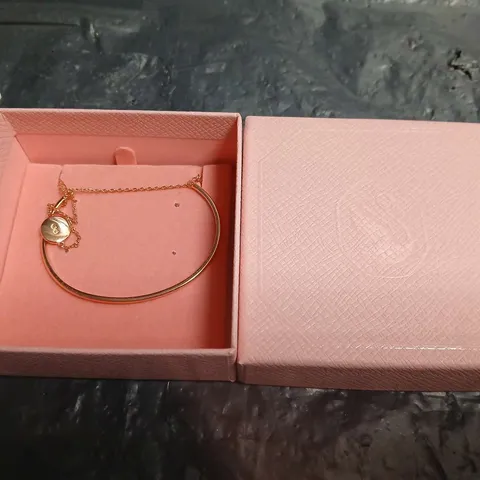 BOXED SWAROVSKI GOLD-TONE BRACELET WITH HEART CHARM 