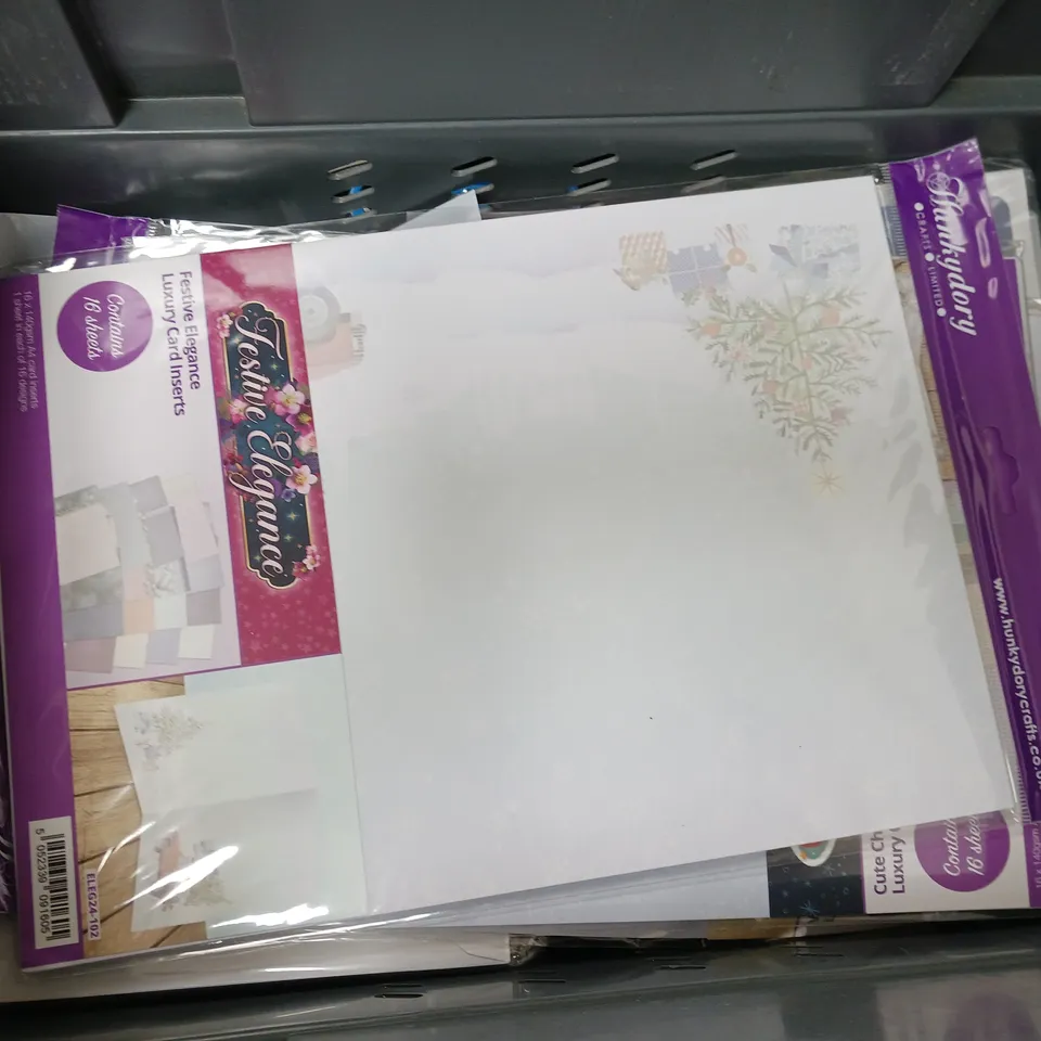 TOTE OF 12 ASSORTED CHRISTMAS THEMED CRAFTS ITEMSTO INCLUDE CARD INSERTS, LUXURY TOPPERS, ETC