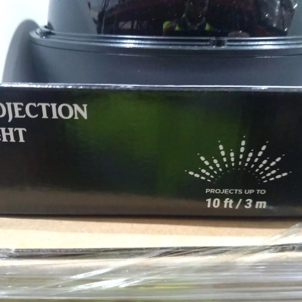 FOUR BRAND NEW BOXED WHITE SNOWFLAKE PROJECTION LIGHTS