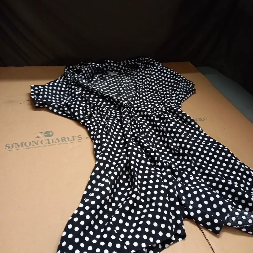 POLKA DOT JUMPSUIT IN BLACK AND WHITE SIZE UNSPECIFIED