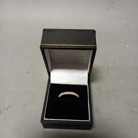 WHITE GOLD 10 POINT DIAMOND HALF RING