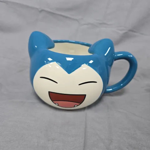 CERAMIC NOVELTY MUG WITH BLUE CAT-EAR RIM AND LAUGHING-FACE DESIGN POKEMON