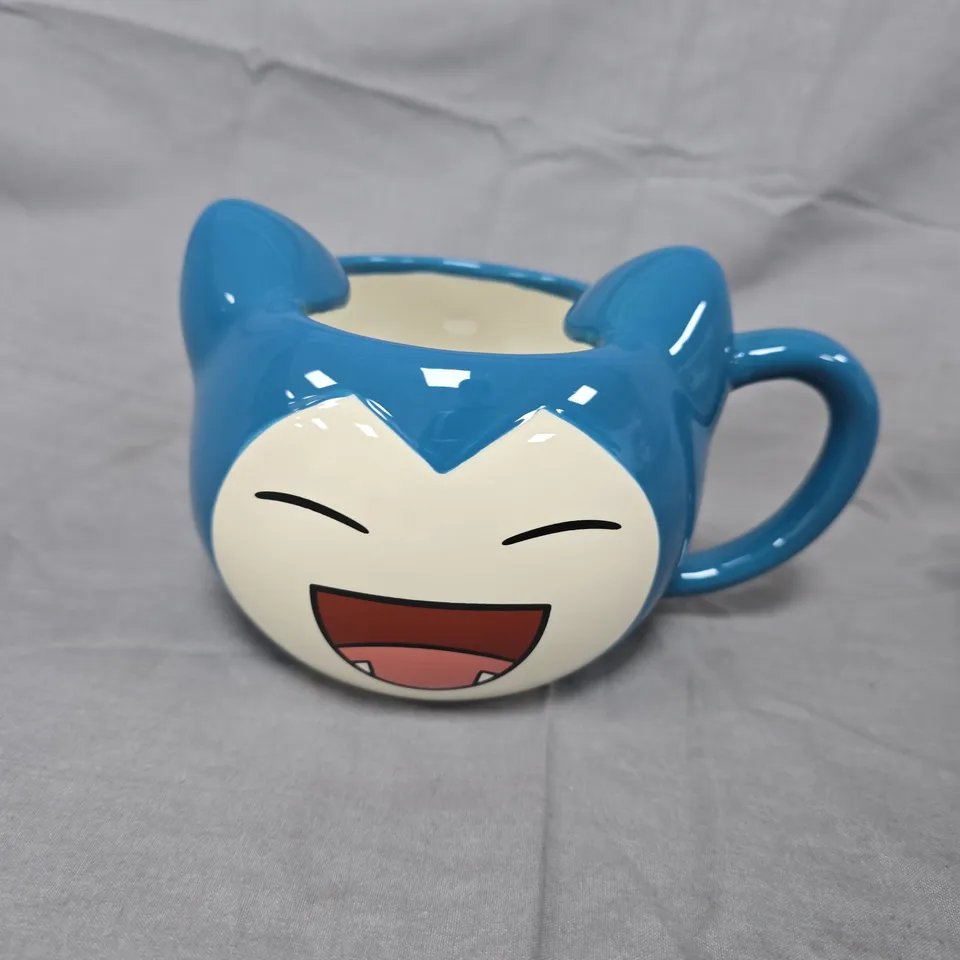 CERAMIC NOVELTY MUG WITH BLUE CAT-EAR RIM AND LAUGHING-FACE DESIGN POKEMON