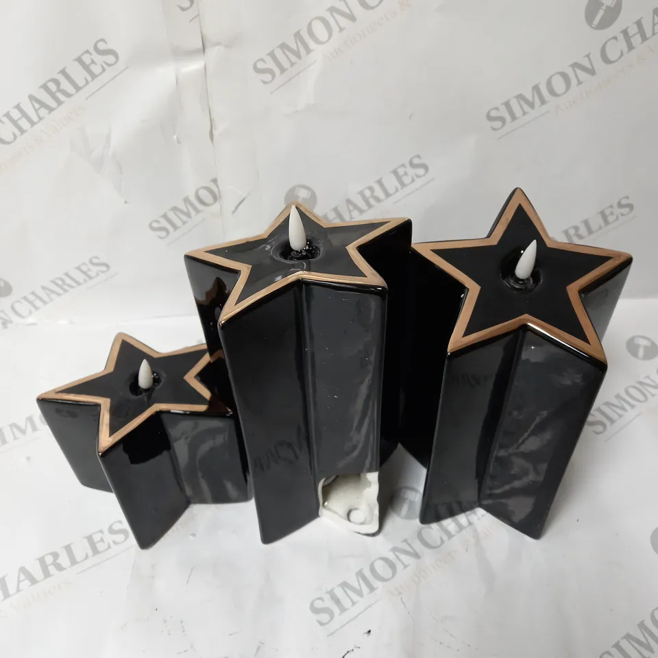 HOME REFLECTIONS CERAMIC STAR PRE-LIT CANDLES - BLACK
