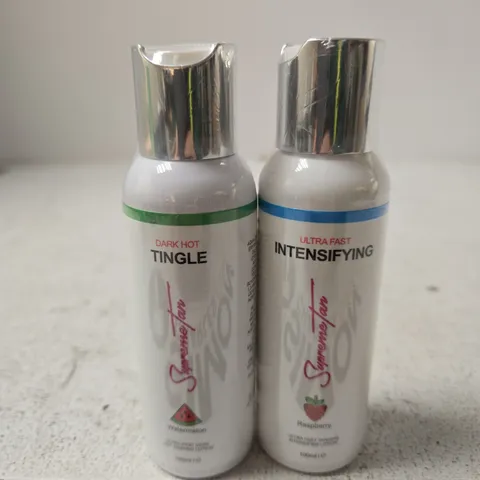 SUPREME TAN TWO MINI BOTTLES LABELED 'DARK HOT TINGLE' AND 'ULTRA FAST INTENSIFYING'