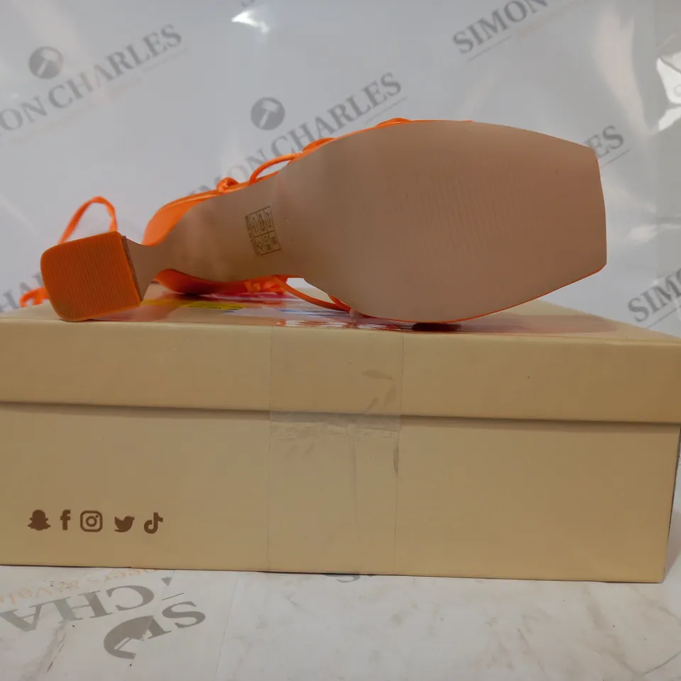 BOXED PAIR OF PUBLIC DESIRE ENDLESS POTENTIAL OPEN TOE STRAPPY PLATFORM HEELED SANDALS IN ORANGE SATIN UK SIZE 6