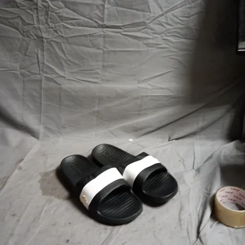 LACOSTE BLACK SLIDES WITH WHITE STRAP – UNISEX UK 11