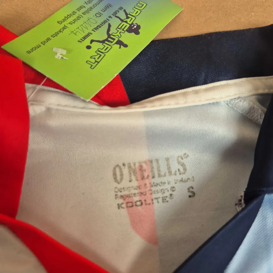 O'NEILLS FOOTBALL SHIRT – WHITE & LIGHT BLUE BLOCK WITH RED SPONSOR (UK SMALL)