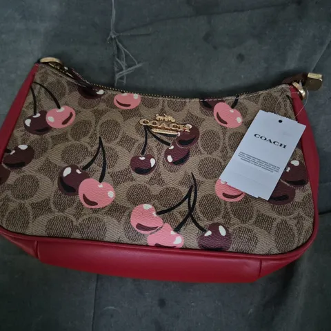 COACH HANDBAG β CHERRY PRINT CANVAS WITH RED LEATHER TRIM