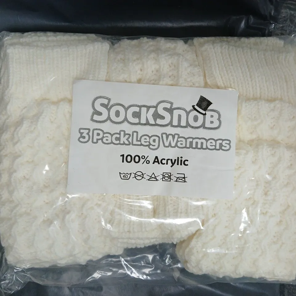 BOX OF APPROXIMATELY 20 BAGS TO INCLUDE 3 PAIRS OF LEG WARMERS IN OFF WHITE - COLLECTION ONLY