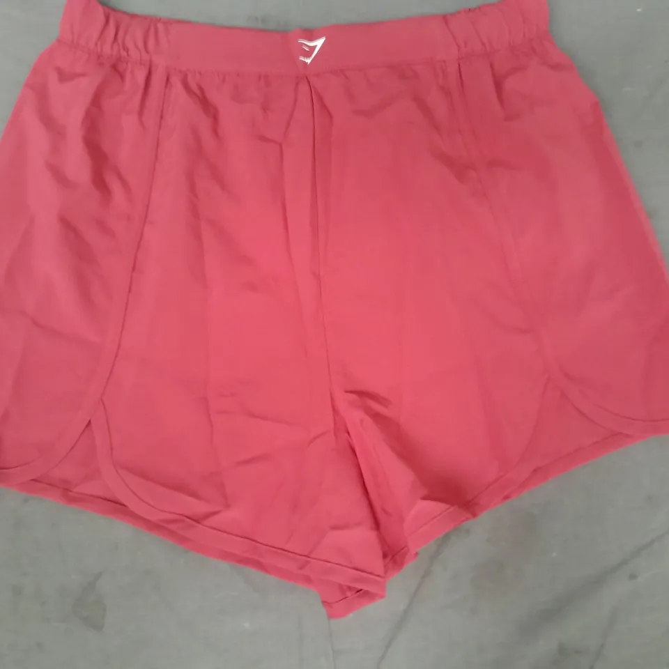 GYM SHARK SCALLOP HEM SHAPED SHORTS IN PINK SIZE LARGE