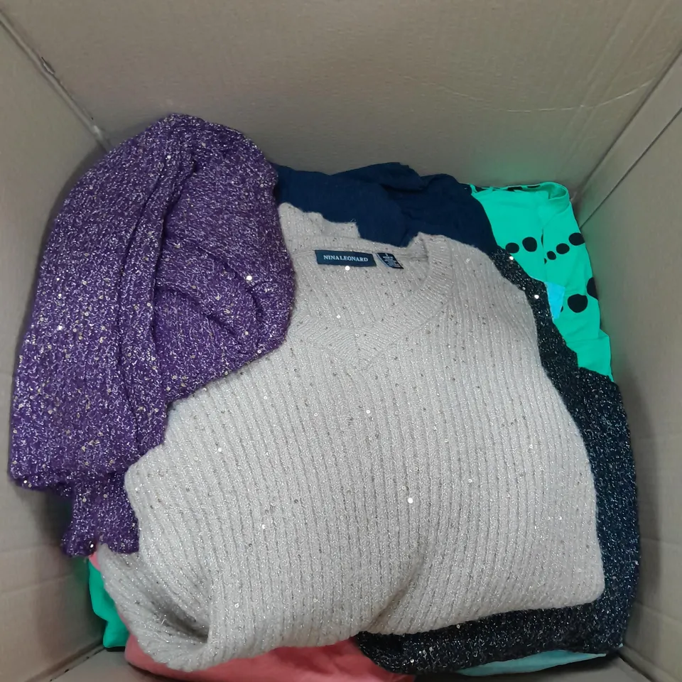 LARGE BOX OF ASSORTED CLOTHING ITEMS TOO INCLUDE TOPS , TROUSERS AND JUMPERS COMING IN DIFFERENT COLOURS AND SIZES 