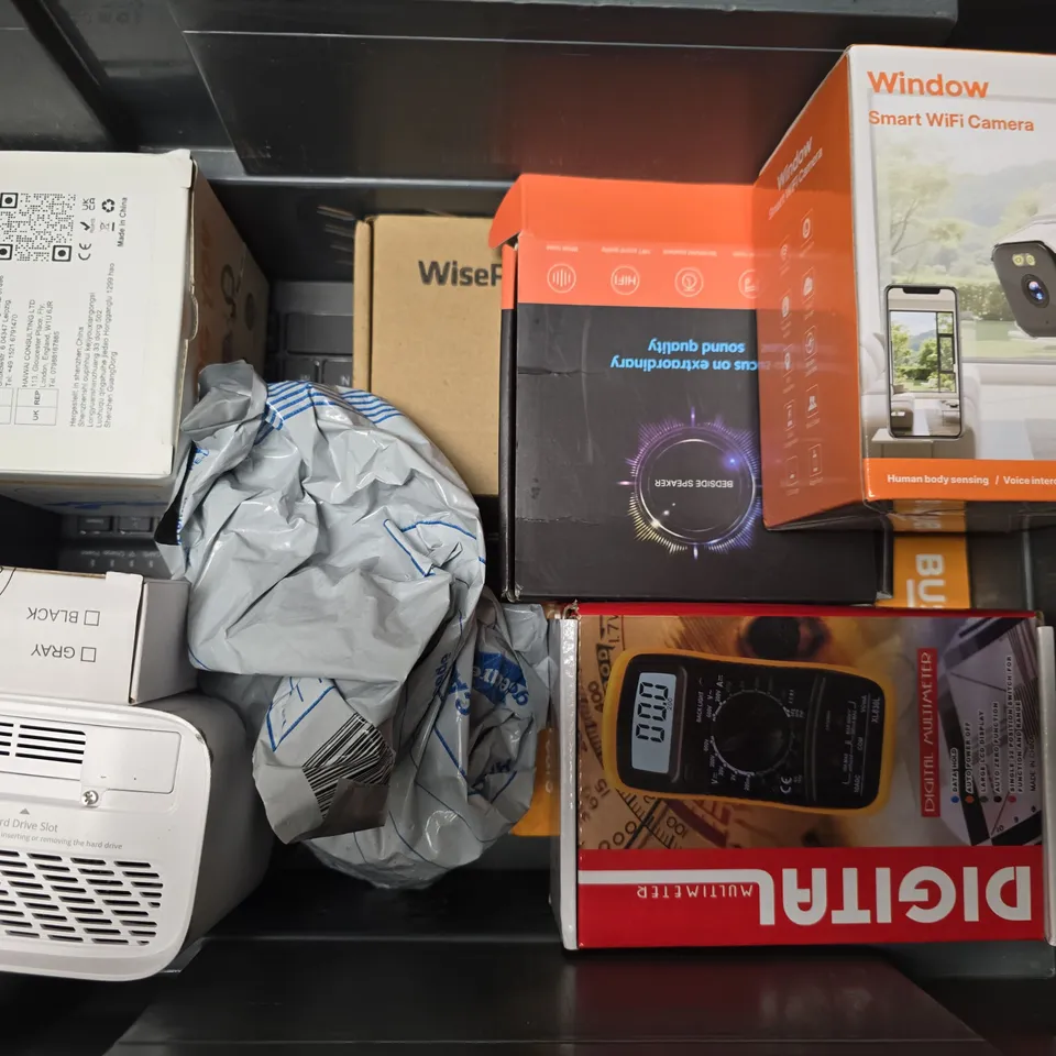 APPROXIMATELY 9 ASSORTED ELECTRICAL ITEMS TO INCLUDE DOG TOY, WINDOW SMART WIFI CAMERA, BUSH PORTABLE CASSETTE PLAYER, ETC