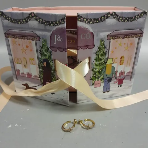 J&CO CRUCIFIX STYLE HOOP EARRINGS