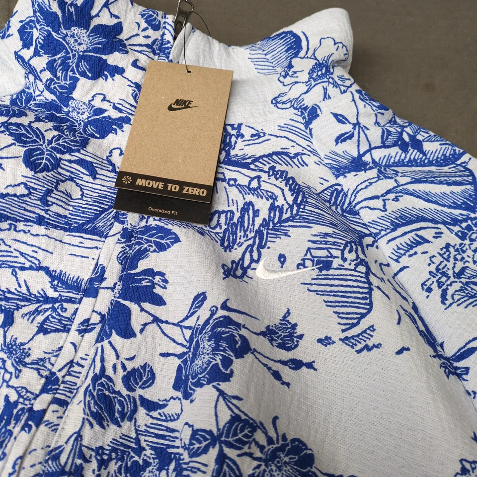 NIKE MOVE TO ZERO WOMEN'S FLORAL PRINT ZIP-UP HOODIE – OVERSIZED FIT, LARGE