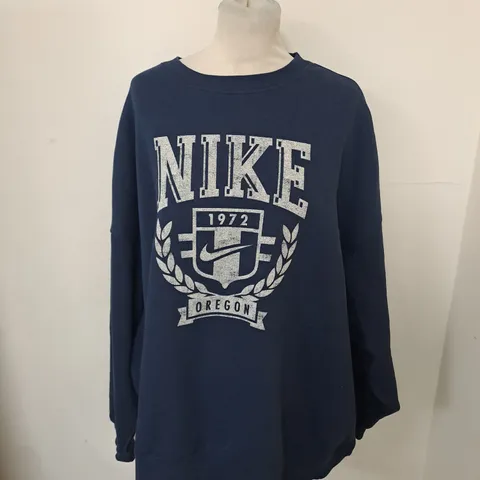 NIKE WOMENS LARGE SWEATER PRINT