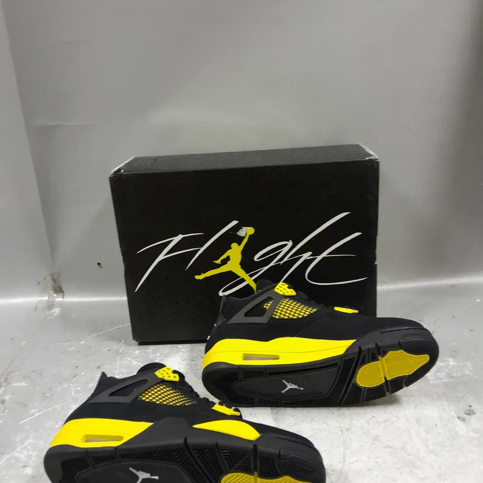 BOXED PAIR OF NIKE AIR JORDAN 4 RETRO BLACK / YELLOW UK 6.5