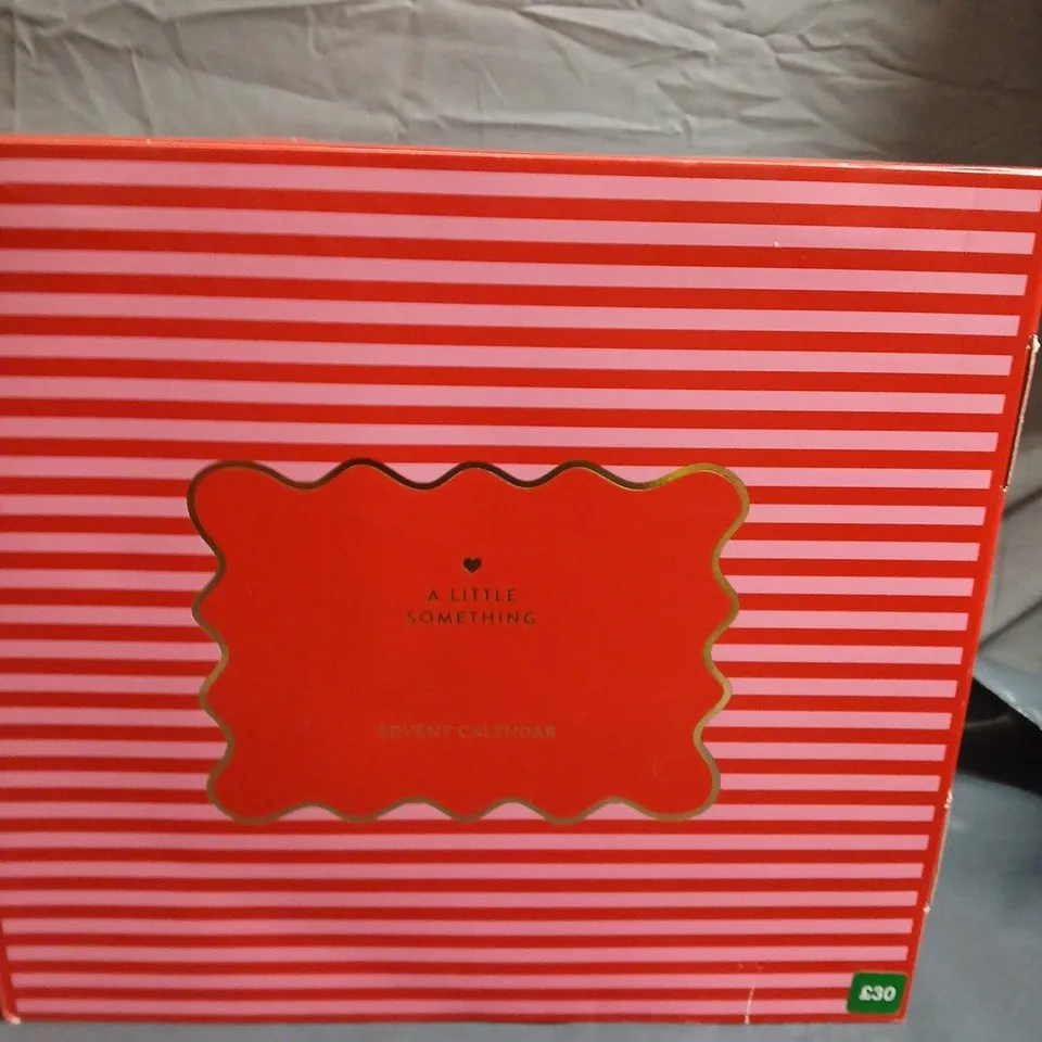 A LITTLE SOMETHING ADVENT CALENDAR – 24-DRAWER RED & WHITE STRIPED BOX