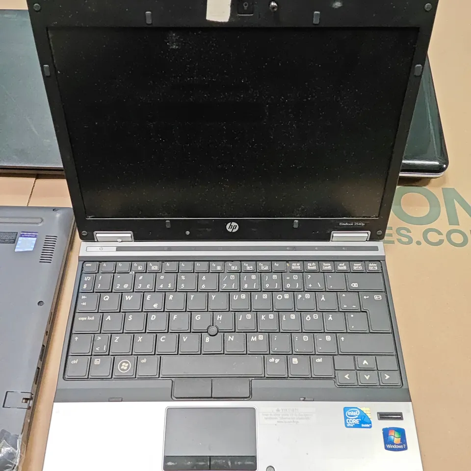 LOT OF 4 ASSORTED UNBOXED LAPTOPS TO INCLUDE HP AND DELL