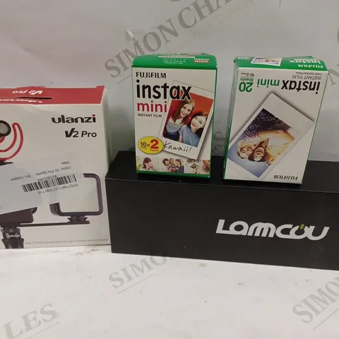 BOX TO CONTAIN 4 X ASSORTED CAMERA ACCESSORIES. INCLUDES CAMERA TRIPODS/MOUNTS, INSTANT FILM PAPER ETC