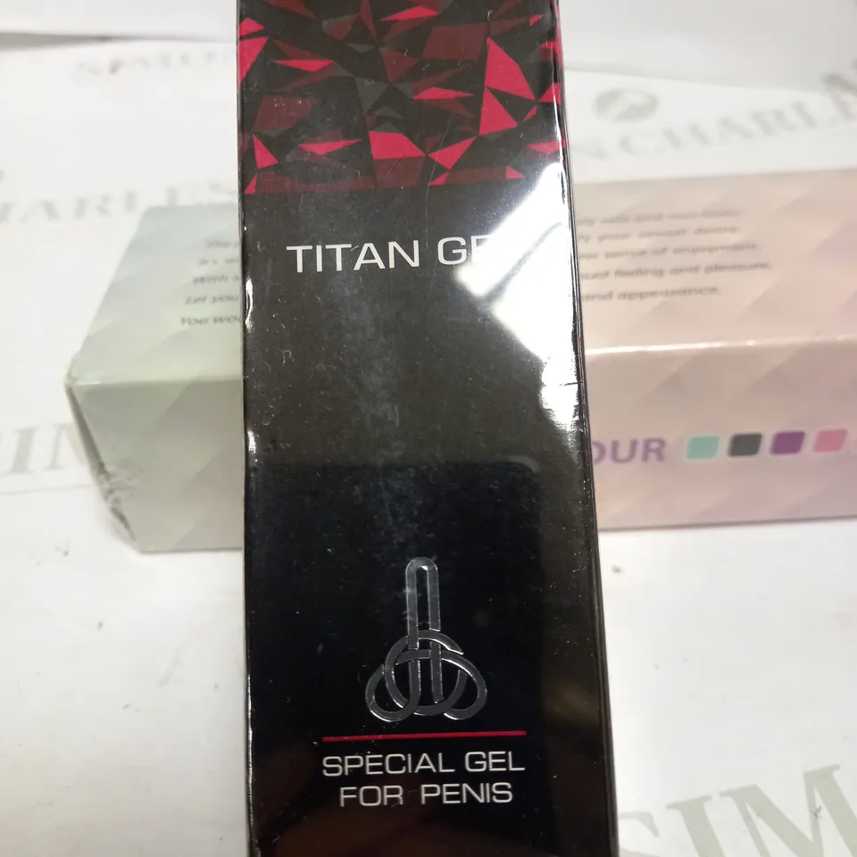 LOT OF TWO TO INCLUDE BODY MASSAGER AND TITAN GEL