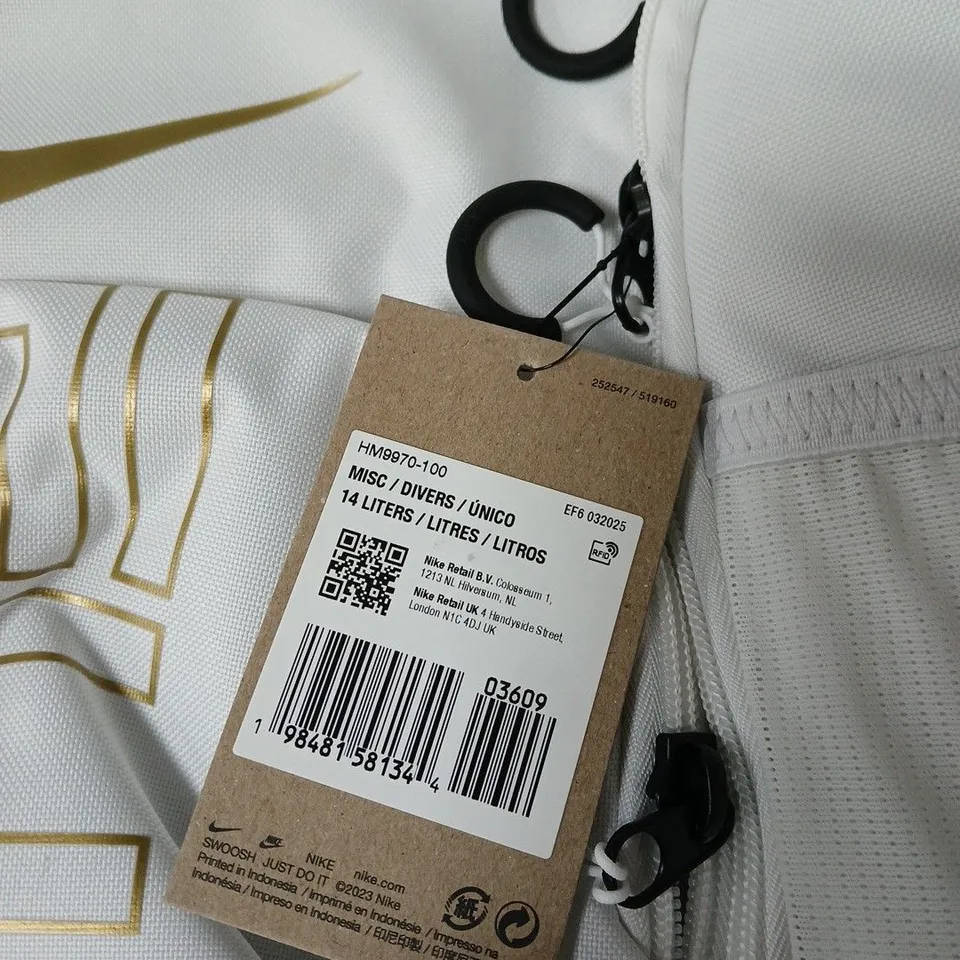 NIKE 14L BACKPACK – WHITE WITH GOLD SWOOSH AND BLACK BASE