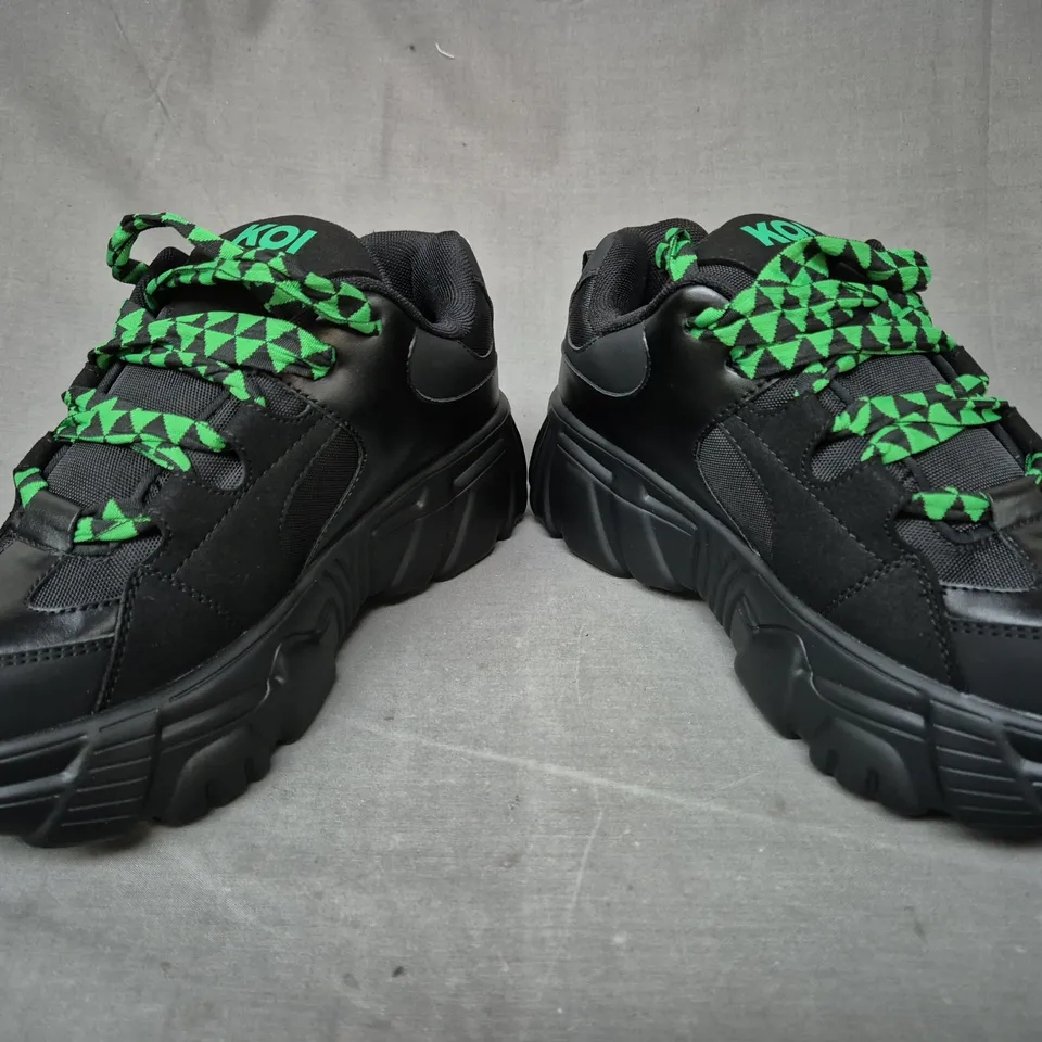 BOXED PAIR OF KOI RICTA FLIP MEN'S CHUNKY TRAINERS IN BLACK/GREEN UK SIZE 7