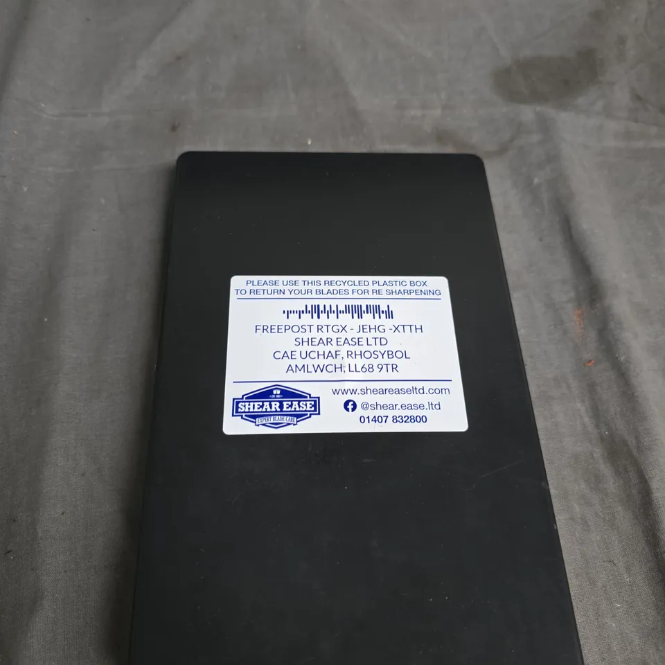 A SET OF SHEAR EASE , PURFECT CLIPPER BLADES IN SIZES 40# 0.25MM.