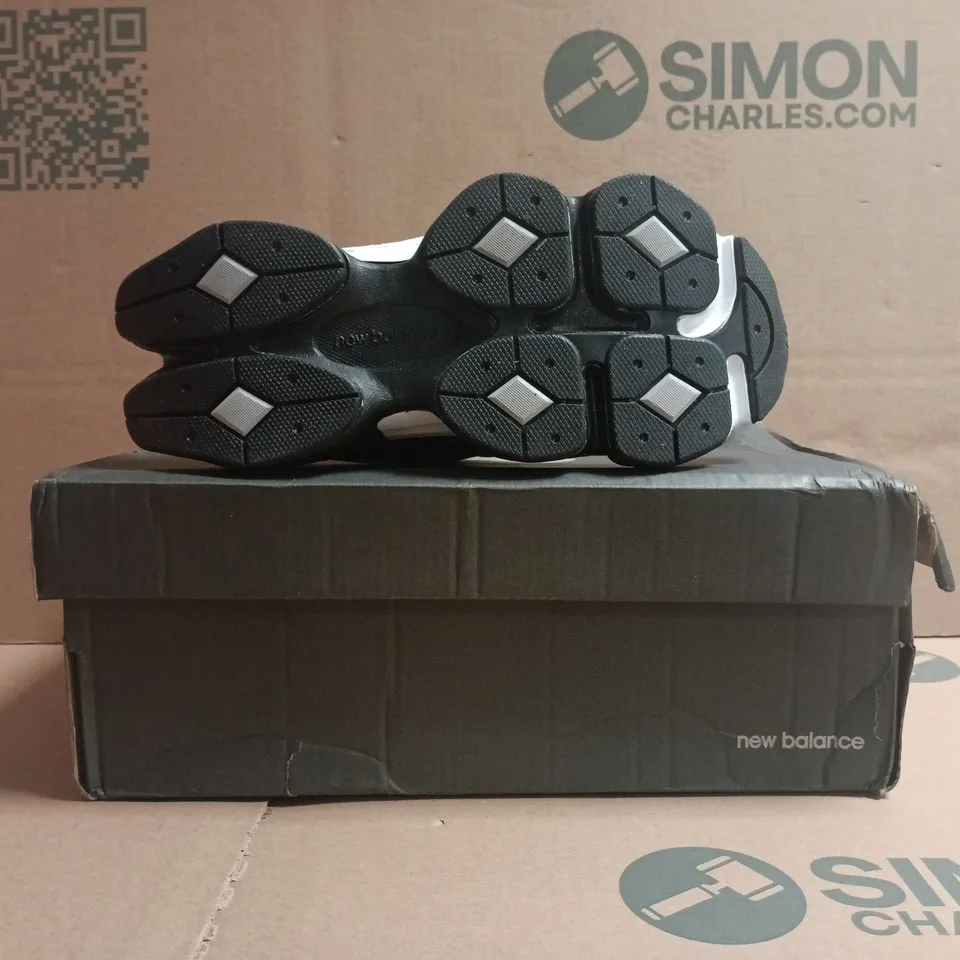 BOXED PAIR OF NEW BALANCE 9060 TRAINERS BLACK/WHITE SIZE UK 4.5