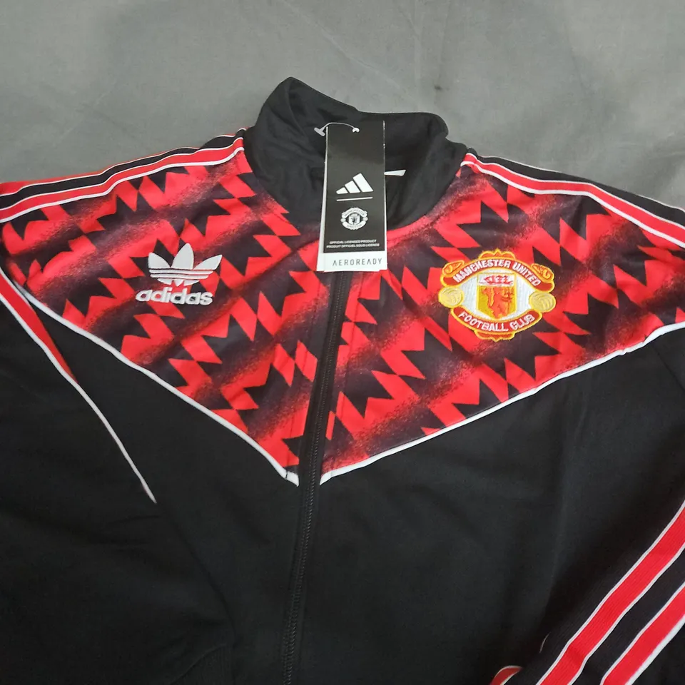 ADIDAS ORIGINAL RETRO MANCHESTER UNITED TRACK JACKET – SIZE UNSPECIFIED