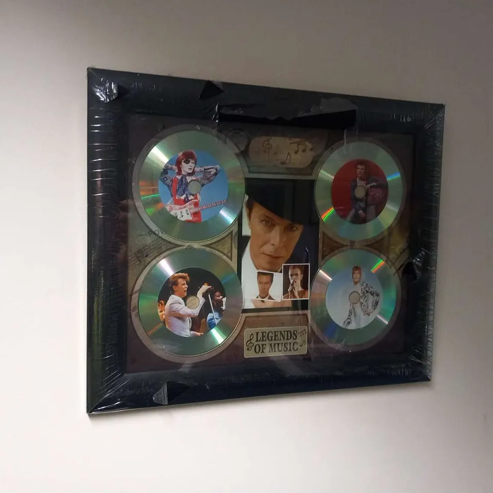 TWO ASSORTED 'LEGENDS OF MUSIC' FRAMED COLLAGES TO INCLUDE; TAKE THAT AND DAVID BOWIE