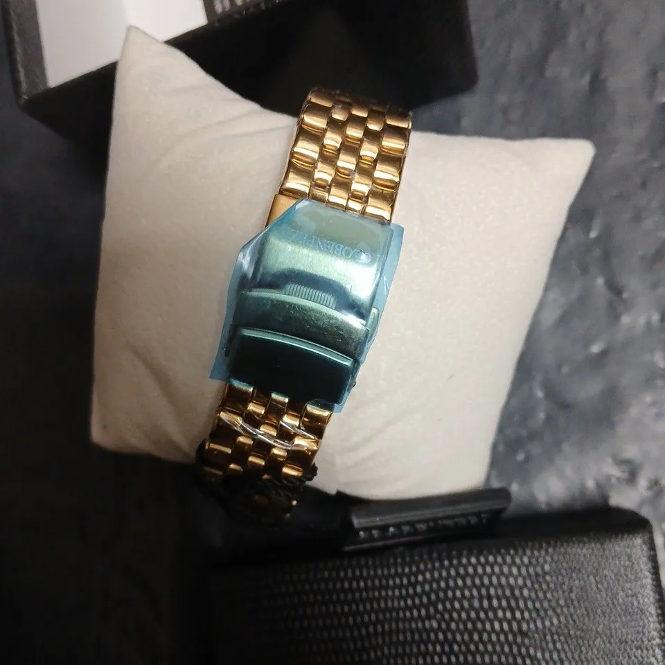 GLOBENFELD SKELETON DIAL GOLD-TONE WATCH